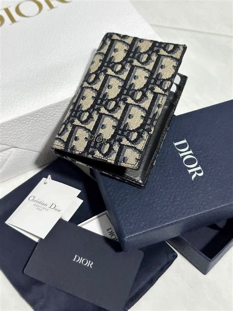 dior beige oblique wallet.